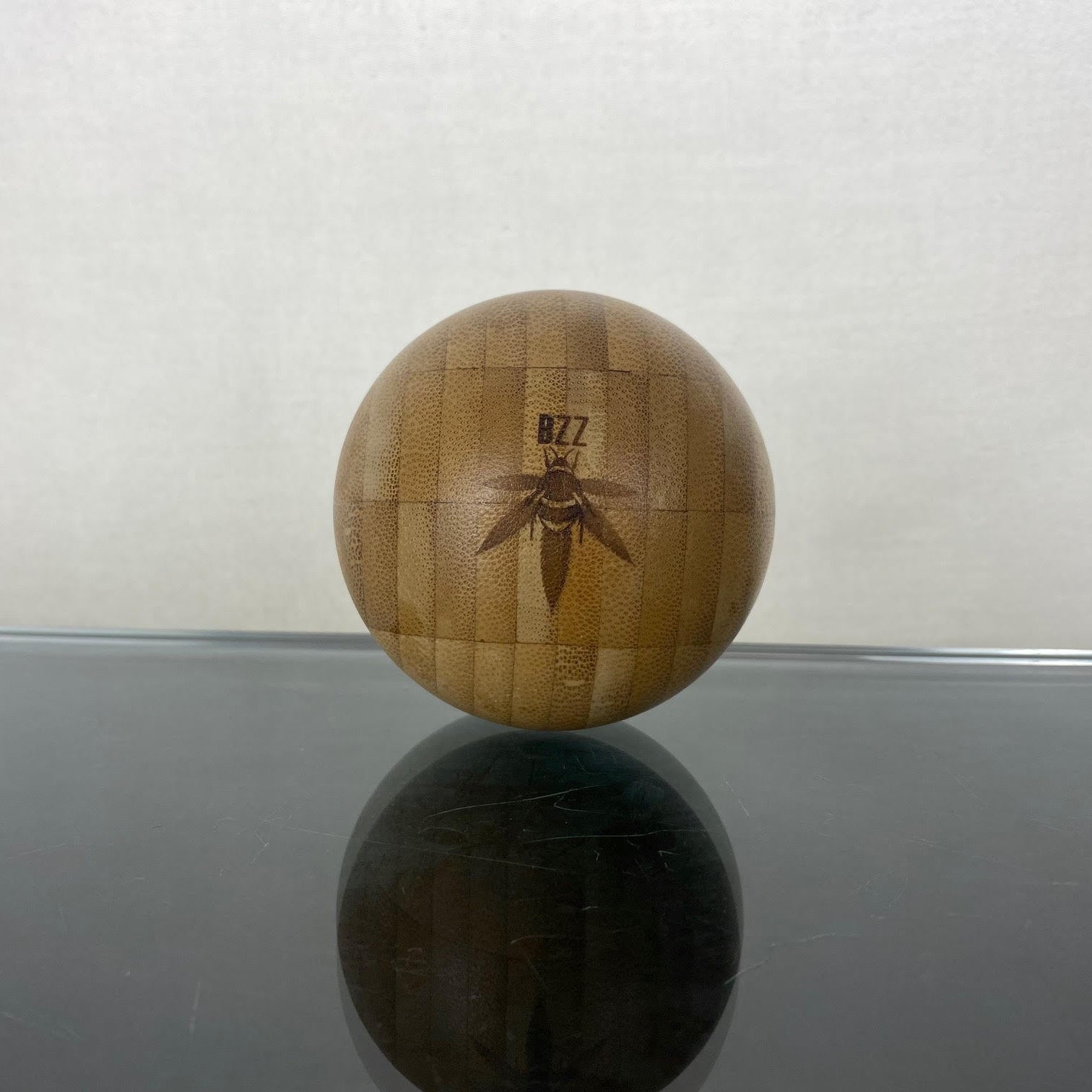 hollow bamboo ball, with screw top for discreetly hiding herbs