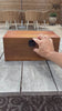 The XL BzzBox a.k.a the Treasure Chest. The video shows the features f the box including the lock, three airtight stash jars, lid compartment, magnetic lid feature, and the hole in the tray for easy clean up.