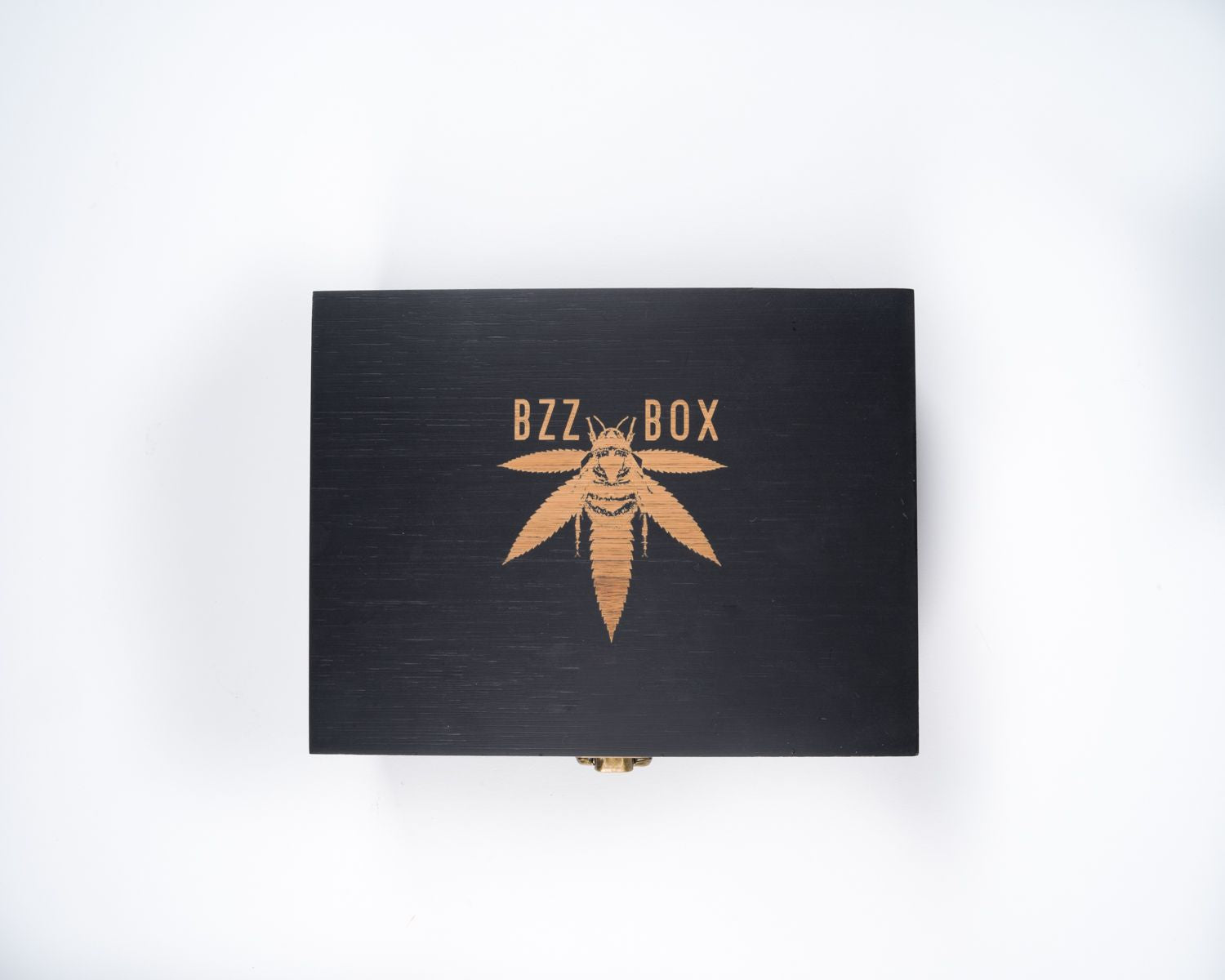 The Bzz Box small stash box in black.